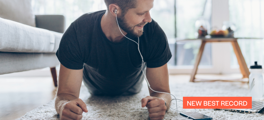 Man receives a new best record notification during a workout session